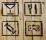 several simple icons on wooden background