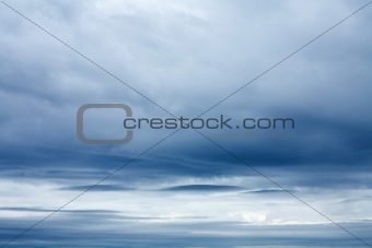 gloomy sky with wind-smoothed clouds