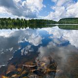 norwegian lake, golden stones under water