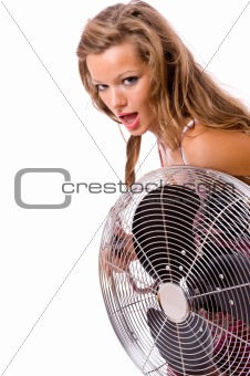 Sexy young girl uses the fan