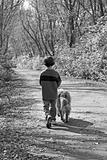 Boy Walking the Dog