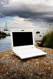 white laptop in the natur