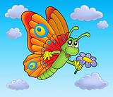 Butterfly with flower on blue sky