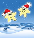 Christmas stars on starry sky