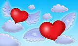 hearts with wings on blue sky.