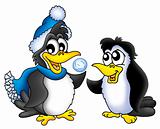 Two penguins with snowball