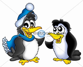 Two penguins with snowball