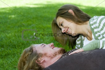 Young couple hugging in a park
