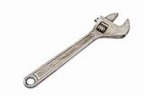 Old adjustable spanner isolated