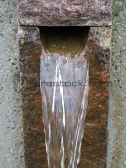 running water through stone
