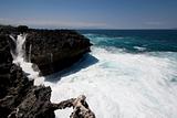 Rocky cliff in ocean