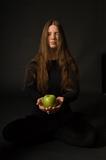 Woman with green apple