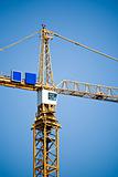 crane tower against blue sky