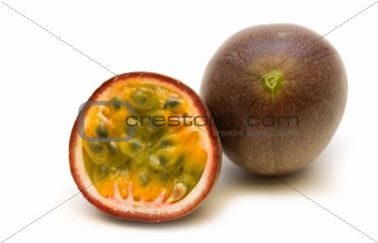 two fresh passionfruits on white background