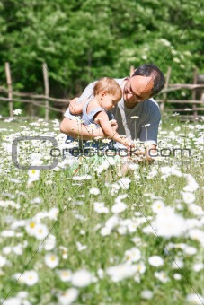 father and son on natural background