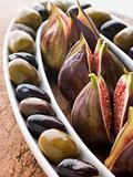 Dish of Green and Black Olives with Fresh Figs