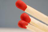 Close up of three red wooden matches