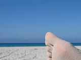 sandy foot on the beach
