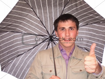 Young man under a umbrella