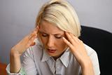 Woman with severe Headache (Migraine).