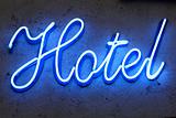 blue neon hotel sign, france