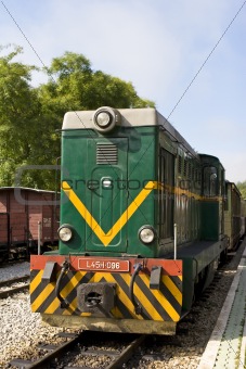 colorful old diesel train in railway station