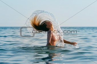 girl with long hair in the sea