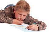 Blond boy drawing a picture