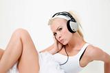 sexy woman listening to music with headphones