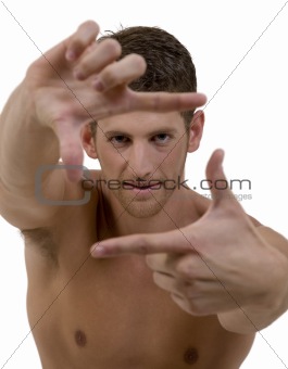 finger frame gesture by a handsome shirtless man