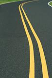 Curvy road with double yellow line