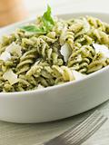 Bowl of Fusilli Pasta dressed in Pesto with Parmesan Shaves