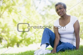 Senior woman relaxing in park