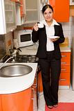businesswoman in kitchen