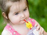Little girl with juice