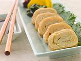 Rolled Dashi Omelette with Pickled Vegetables Soy and Shiso with