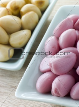 Dishes of Pickled Garlic