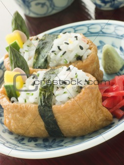 Opened Bean curd Pouches with Citrus Sushi Rice Vegetables Wasab