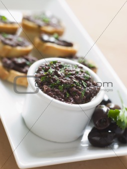 Black Tapenade on Toasts