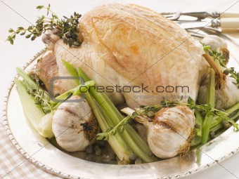 40 Clove of Garlic Roasted Chicken with Baby Spring Vegetables