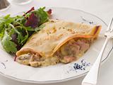 Savoury Pancake filled with Ham Cheese and Mushrooms with dresse