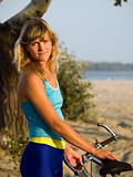 Female cyclist posing outdoors