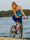 Female cyclist posing outdoors