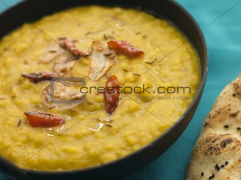 Bowl of Tarka Dal with Naan Bread