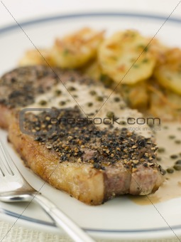 Steak au Poirve' with Saut Potatoes