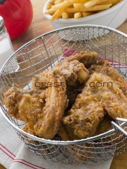 Southern Fried Chicken in a Basket with Fries