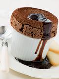Hot Chocolate Souffle with Chocolate sauce and Langue de Chat Bi