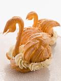 Two Choux Swans filled with Chantilly Cream