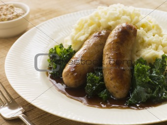 Pork Sausage and Mash with Curly Kale
