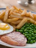 Gammon Steak Fried Egg Peas and Chips